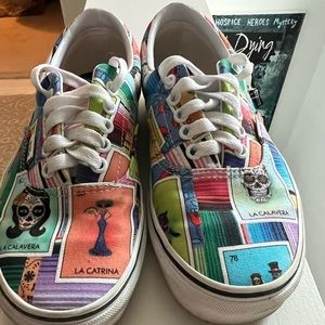 Size 8 Vans. Super cute Day of the Dead Vans. Worn a couple times. EUC.